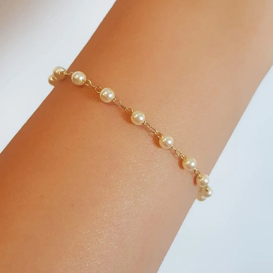 Pearl bracelet plated in 18k gold.